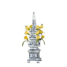 a silver vase with yellow flowers in it on a white background, isolated against a white backdrop