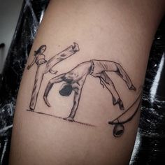 a person doing a handstand on their leg