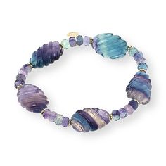 a bracelet with purple and blue beads