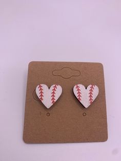 Baseball stud earrings  These earrings are the perfect gifts or accessories at the next game. They are perfect to support your favorite team or player!  Materials: nickel free earring post, wood Care instructions: Do not leave in hot or cold car. Avoid dropping! Ready to ship! Wooden Earrings Studs, Baseball Earrings, Nickel Free Earrings, Wood Care, Earring Post, Earrings Stud, Wooden Earrings, Leave In, In Hot