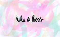 the word like a boss written in black ink on a pink and green painted background