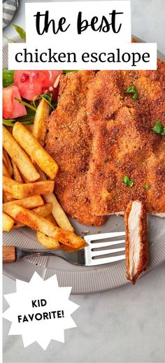 the best chicken escalope with french fries is on a plate and there is a fork next to it