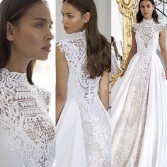 a woman in a white wedding dress looking at the back of her gown, while she is