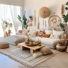 a living room filled with lots of furniture and plants