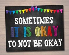 a chalkboard sign that says sometimes it's okay to not be oky