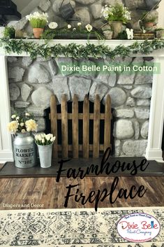 a fireplace with some flowers and plants on the mantel above it that says, dixie bell paint in cotton farmhouse fireplace fireplace