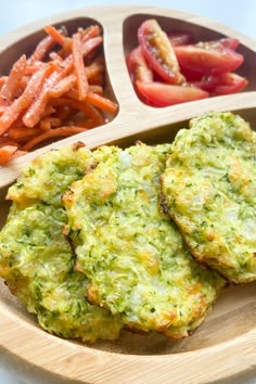 broccoli patties with carrots and tomatoes on a wooden plate, ready to be eaten