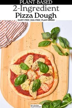 two ingredient pizza dough with basil and mozzarella on top, sitting on a cutting board