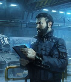 a man with a beard is holding a tablet in his hand and looking at something