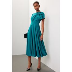 Green jacquard (60% Acetate, 40% Polyester). Lining (73% Acetate, 27% Silk). A-line. 3/4 sleeves. Boat neck. Back zipper closure. 48.5" from shoulder to hemline. Imported. Fall A-line Midi Dress For Dinner, Fall Cocktail A-line Dress, Chic A-line Midi Dress For Formal Occasions, Chic Fit And Flare Tea Length Dress, Dressy A-line Midi Dress For Evening, Pleated A-line Midi Dress For Dinner, Dressy A-line Midi Dress For Fall, A-line Midi Dress For Fall Cocktail Events, Dressy A-line Evening Midi Dress