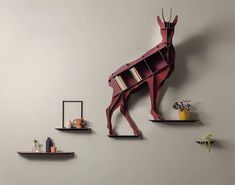 three shelves are arranged in the shape of deers