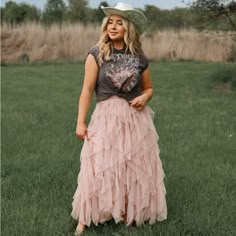 Brand New. An Elegant Blush Pink Colored Midi Skirt With Voluminous Shift Material With Ruffle Detailing, An Elastic Waistband, And A Tiered Silhouette That Falls Into A Full Mid-Calf Cascade. Waist: S 24” M 26” L ”30” Model Is 5’6 And Wearing A Size Medium Photos Are Our Own And Display The Exact Item You Will Receive. Cart With Confidence! Wedding Guest Skirt Special Ocassion Spring Summer Vacation Outfit Cruise Resort Clothing Boho Cowgirl Fashion Fairy Cottage Clothing Tulle Maxi Skirt Long Tops With Tulle Skirts, Tulle Skirt With Tshirt, Pink Western Quinceanera, How To Style A Floral Skirt, Country Skirt Outfits, Country Chic Wedding Outfit Guest, Barn Wedding Guest Outfit, Tule Skirt Outfit, Pink Tulle Skirt Outfit