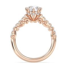 a rose gold engagement ring with diamonds on the side