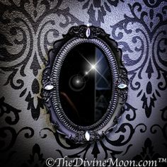 an ornate mirror is hanging on the wall