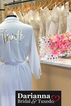 the bridal and tuxedo store is selling bride's gowns for sale