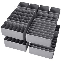 six gray plastic drawers with dividers on each side