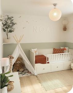 a child's room with a teepee tent and stuffed animals