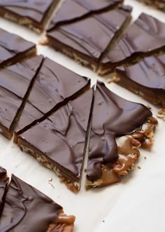 there are many pieces of chocolate that have been cut into squares and placed on top of each other