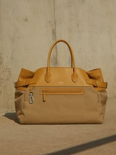 THE ROW SS22 HOLDALL - STILL LIFE CREATIVE DIRECTION BY CHRIS HOBBS FOR MATCHESFASHION The Row Bag, Soft Bag, Utility Bag, Denim Bag, Creative Direction, Vintage Bags, Casual Bags, Leather Tote Bag