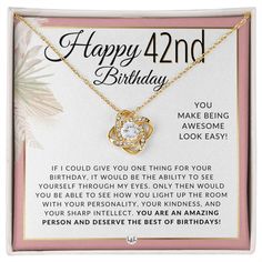 a birthday card with a gold necklace and an image of a heart shaped pendant on it