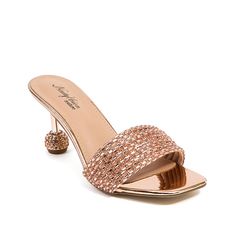 Ninety Union-Sassy Sandal Steal everyone's attention in the Ninety Union Sassy sandal. Striking bead and rhinestone embellishments and a ball heel add glam points to this slip-on sandal that's finished with an elegant square toe front.