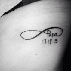 a black and white photo of a woman's stomach with the word papa on it