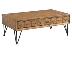 a wooden table with four drawers and metal legs