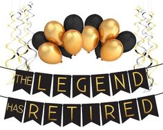 the legend has retired banner with gold and black balloons on it, along with two bunting banners