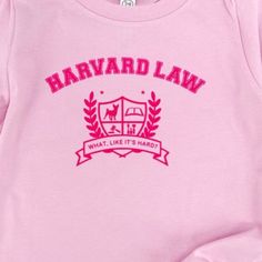 Introducing our limited edition pink tshirt, inspired by the iconic movie "Legally Blonde." This item features a bold "Harvard Law… What, Like It's Hard?" slogan in eye-catching pink ink. Channel your inner Elle Woods and showcase your wit and style with this must-have fashion statement. Embrace the empowering spirit of the film while staying cozy and fashionable in this exclusive tshirt. Legally Blonde Merch, Funny Pink Crew Neck T-shirt, Unisex Pink T-shirt With Screen Print, Pink Crew Neck T-shirt Fan Apparel, Pink Crew Neck T-shirt For Fans, Pink Funny Graphic Print T-shirt, Funny Pink T-shirt With Text Print, Pink Crew Neck T-shirt With Pop Culture Style, Pink Pop Culture T-shirt With Crew Neck