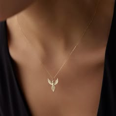 14K Solid Gold Phoenix Necklace - Gold Bird Pendant - Firebird Simurgh Necklace - Mom's Gift - Birthday Gift for Her - Best Gifts for Mothers Celebrate the spirit of renewal and strength with our 14K Solid Gold Phoenix Necklace. This stunning Gold Bird Pendant, inspired by the legendary Firebird Simurgh, is a meaningful and elegant piece perfect for gifting or adding to your personal collection. Features: 🔥 Premium Quality: Crafted from genuine 14K solid gold, this necklace offers lasting durab Necklace Pendants, Gold Necklace With Bird Design As Gift, Bird Design Pendant Necklace Gift, Phoenix Bird Necklace, Phoenix Necklace Pendants, Bird-shaped Bird-design Necklace For Gifts, Meaningful Necklace, Phoenix Necklace, Phoenix Pendant