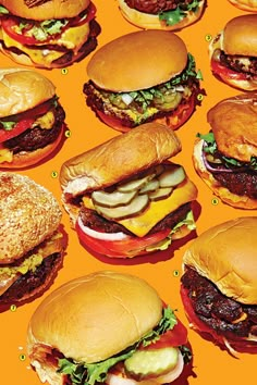 many hamburgers with different toppings are arranged on an orange background, including cheeseburgers and pickles