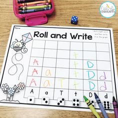 roll and write game with markers, pencils, and crayons on a table