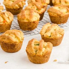 several muffins cooling on a wire rack