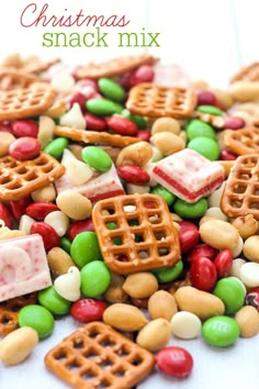 christmas snack mix with pretzels, candy and marshmallows on top