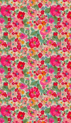 an image of a flowery fabric with many different colors and sizes on the surface