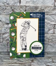 a handmade card featuring a golf player on the green and blue background with white lettering