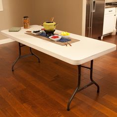 a table with food on it in the middle of a room