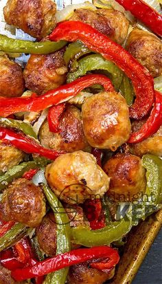 chicken and peppers on a platter ready to be served in the oven for dinner