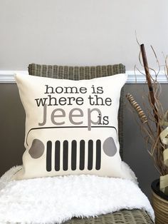 a pillow that says home is where the jeeps are