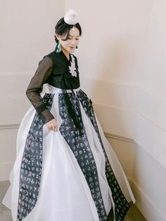 For the daring bride who wants to make a fashion statement. The contrasting black and white are special touches to this modern hanbok, with details of embroidery on the jeogori top and lettering down delicate strips of the skirt. * Brand new sample hanbok * Alterations provided to size according to our size chart * Petticoat sold separately * Accessories sold separately * Please note: Colors may vary due to the nature of the materials, photography lighting, and monitors. Elegant Fitted White Hanbok, Korean Wedding Dresses, Materials Photography, Wedding Hanbok, Hanbok Dress, Hanbok Traditional, Modern Hanbok, Photography Lighting, Modern Bridal