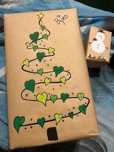 a cardboard box with a christmas tree drawn on it