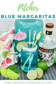 blue margarita cocktail with limes, watermelon and mint