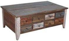 an old wooden table with drawers is shown