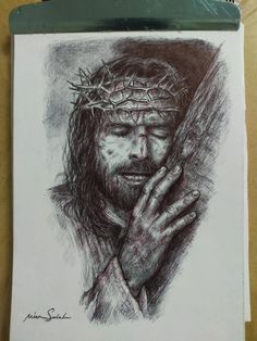 a drawing of jesus holding the cross with his hands