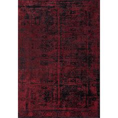 a red rug with black and grey designs on it