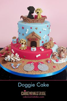 there is a cake that has dogs in the doghouse on it and other decorations