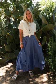 An essential boho skirt, flowy and fabulous, is the Jakaranda Layered Skirt - with its color and playful hem, you'll feel confident and fashionable wherever you go! Pretty, flowy, semi-sheer, woven fabric in two layers Long and flowy skirt silhouette at maxi length Wide, smocked, elastic waistband for the best fit Uneven handkerchief bottom edges with lettuce hems and side slits for added boho style Thigh-length lining for added coverage Pair with: Evermore Seamless Lace Racerback Bralette, Kind Long Flowy Skirt With Layered Hem, Long Layered Hem Flowy Skirt, Boho Skirts Long, Versatile Full-length Flowy Skirt, Flowy A-line Maxi Skirt In Solid Color, Long Flowy Skirts, Purple Flowy Tiered Maxi Skirt, Layers Long, Skirt Flowy