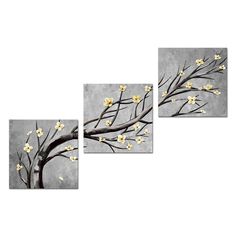 three pieces of art with yellow flowers on the branches and one piece is black and white