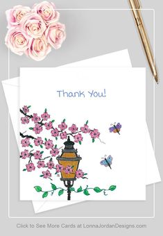 a thank card with pink flowers and a lamp postcard