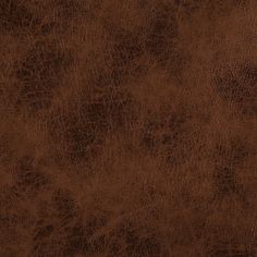 a brown leather texture background that looks like it has been used as a wallpaper